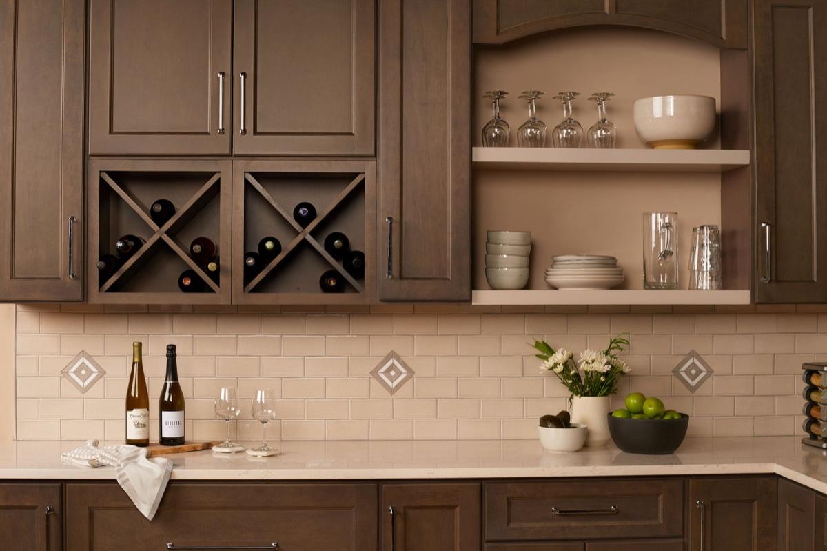 Rich espresso cabinetry with built-in wine rack